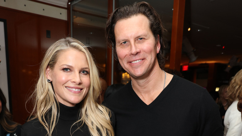 Ali Larter and Hayes MacArthur posing