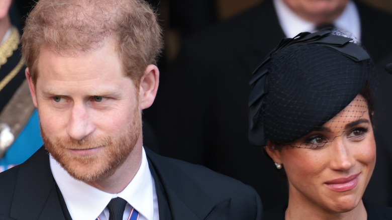 Prince Harry and Meghan Markle posing 