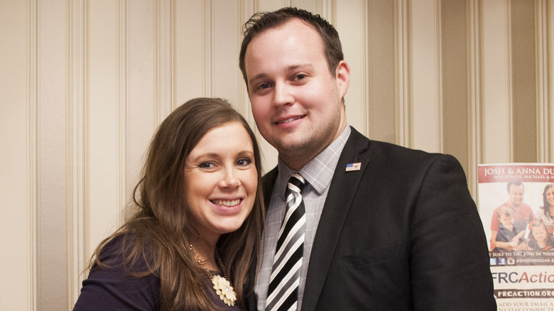 Josh and Anna Duggar pose at an event