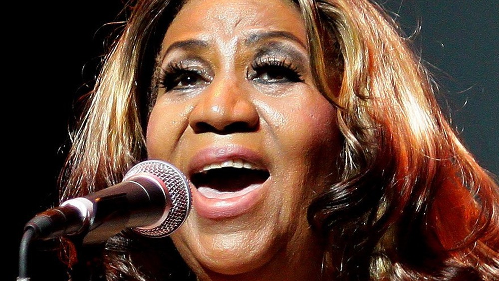 Aretha Franklin singing at a concert