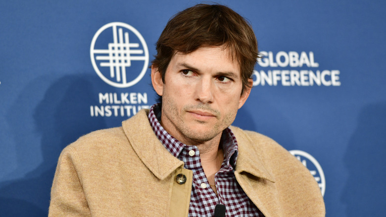 Ashton Kutcher looking moody at an event
