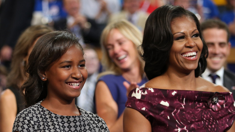 Sasha and Michelle Obama laughing