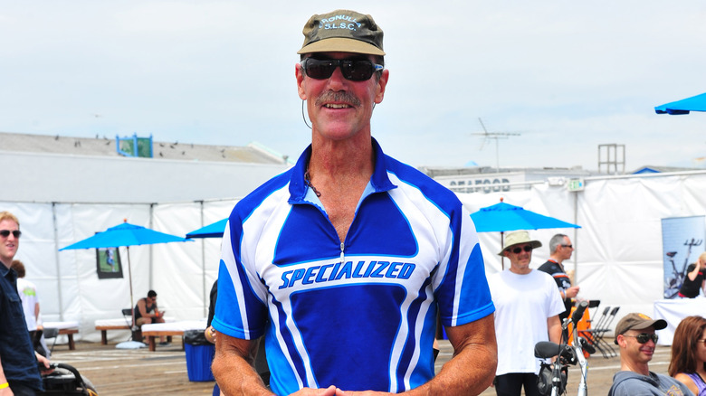 Mike Newman posing at a bike riding event
