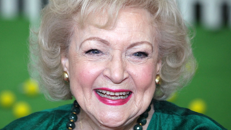 Betty White smiles for a photo. 