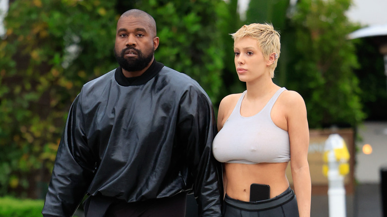Kanye West and Bianca Censori walking