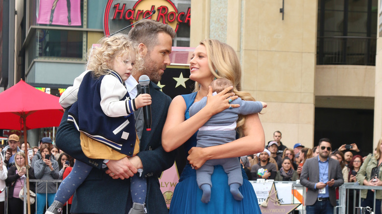 Blake Lively and Ryan Reynolds on red carpet with daughters