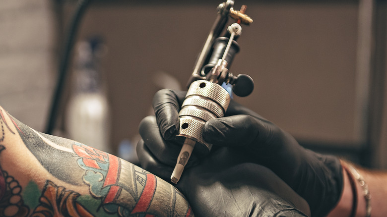 Tattoo machine in use 