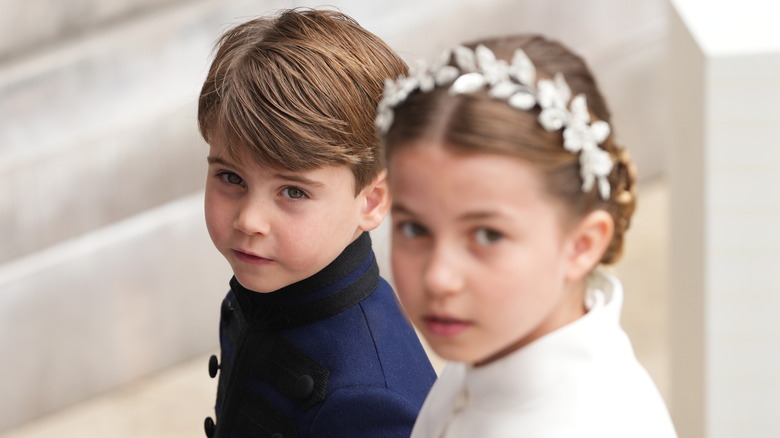Prince Louis and Princess Charlotte looking serious