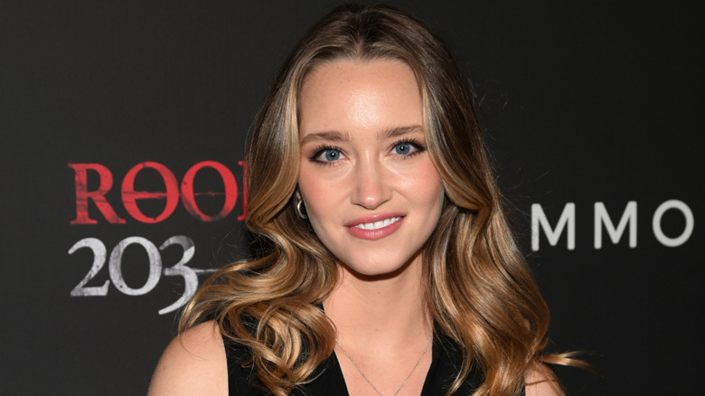 Francesca Xuereb smiling and looking directly at the camera at a movie premiere