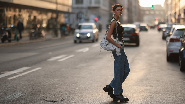 Woman wearing chunky loafers and jeans