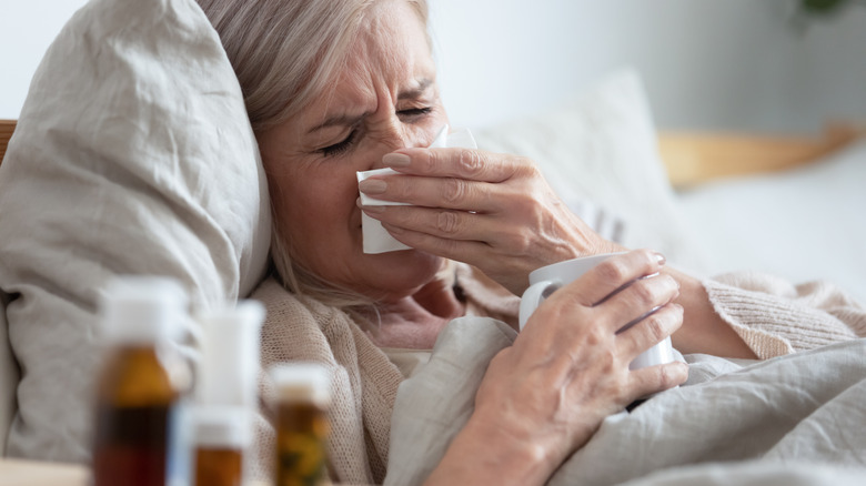 Woman with cough medicine