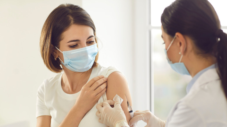 Woman getting a vaccine