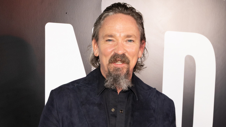 image of James Jordan smiling at the Landman premiere