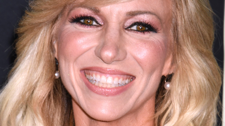 close up of Debbie Gibson smiling broadly