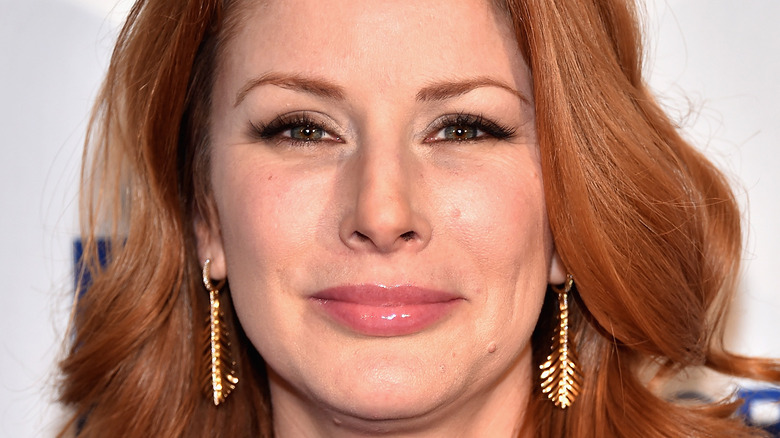 Diane Neal smiling on the red carpet