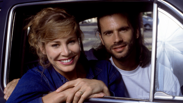 Kathleen Kinmont and husband, American actor Lorenzo Lamas, pose for a portrait on the set of adventure and sci-fi film Final Round in June 1992 in Van Nuys, California.