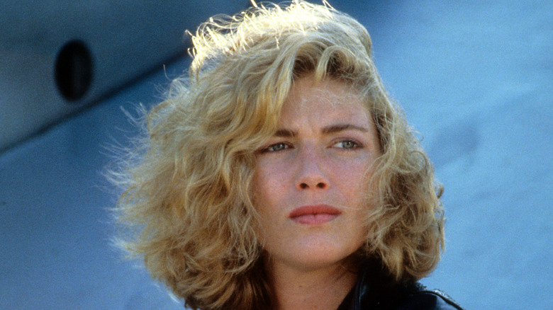 Kelly McGillis with a stoic expression on the set of 'Top Gun'