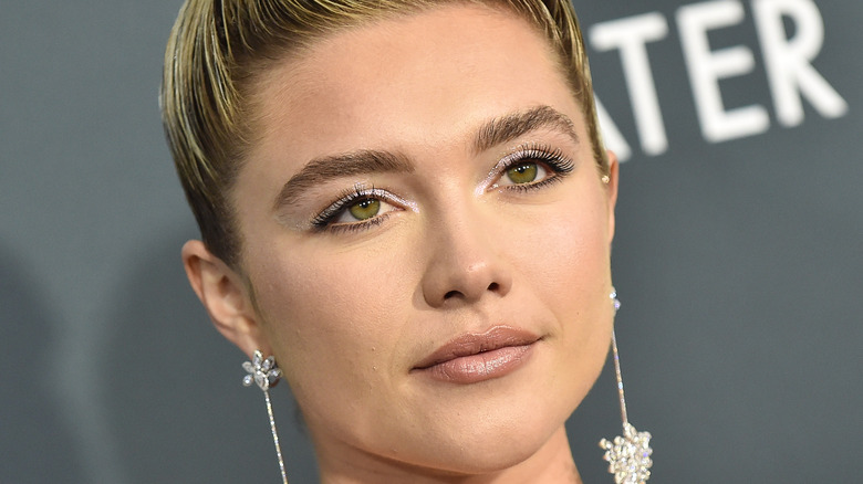 Florence Pugh posing at event