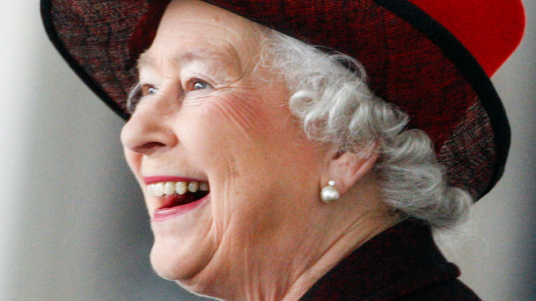 Queen Elizabeth laughing