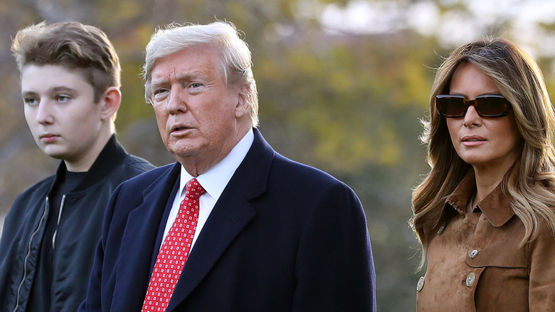 Donald, Melania and Barron Trump looking sullen at an event