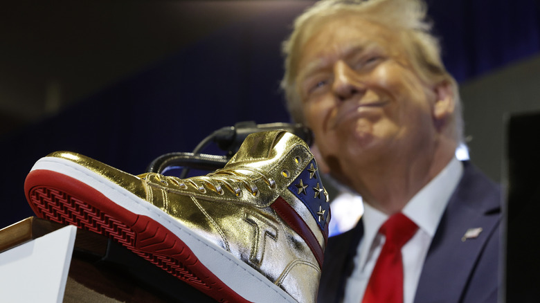 Donald Trump delivers remarks while introducing red soled sneakers