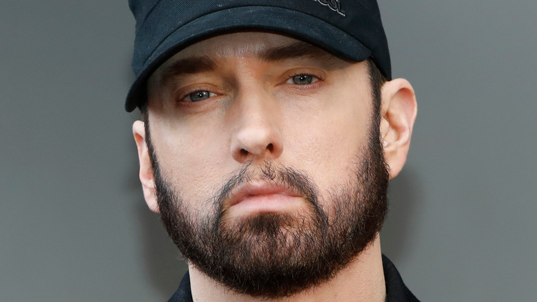 Eminem with dark hair and eyebrows