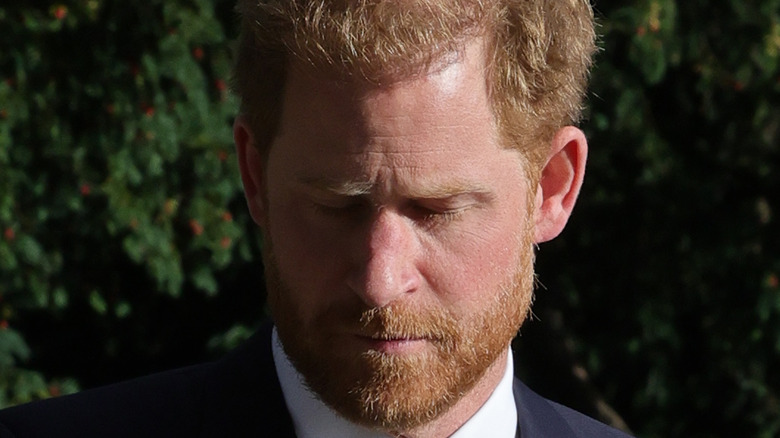 Prince Harry at queen memorial 