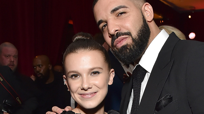 Millie Bobby Brown and Drake embracing