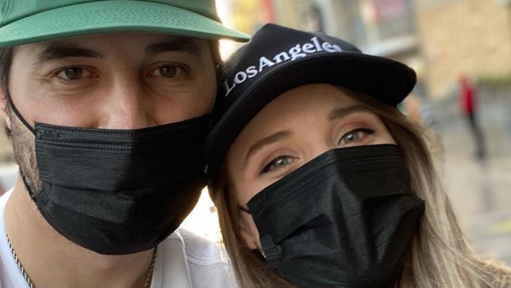 Jeremy and Jinger Vuolo wearing face masks