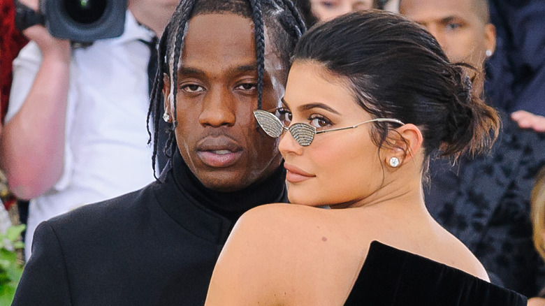 Travis Scott and Kylie Jenner pose together on red carpet
