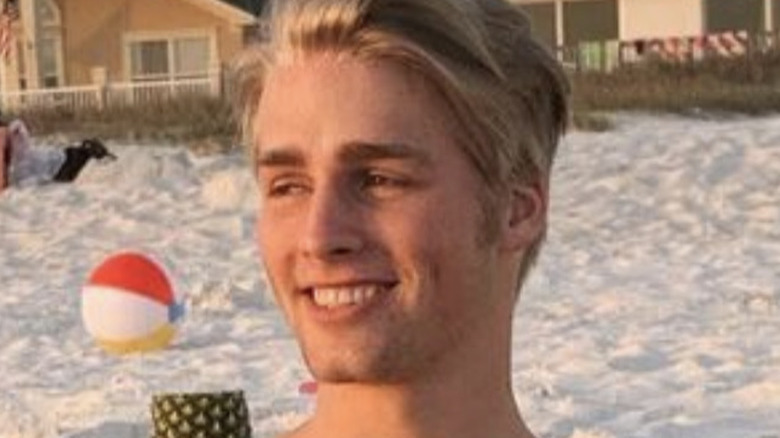 Micah Plath smiling at the beach