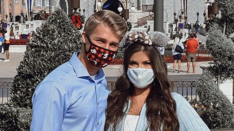 Micah Plath and Caroline Alexis posing at Disney World