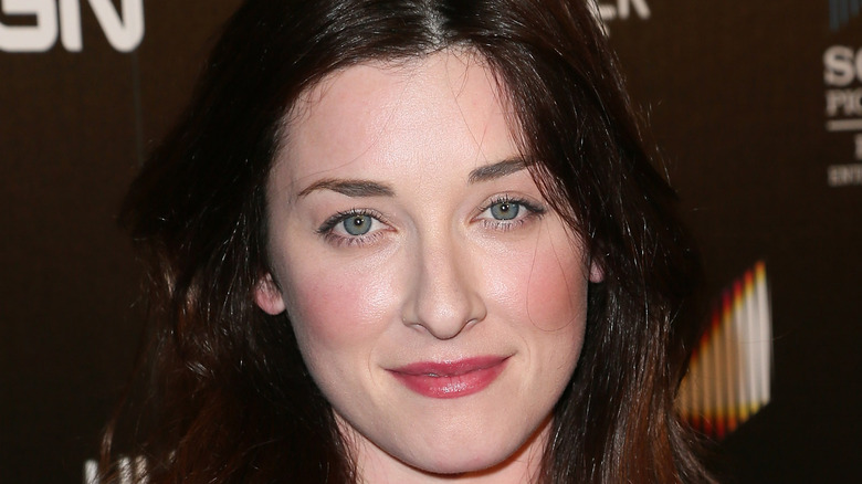 Margo Harshman smiling