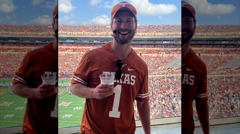 Glen Powell at a 2022 Texas Longhorn football
