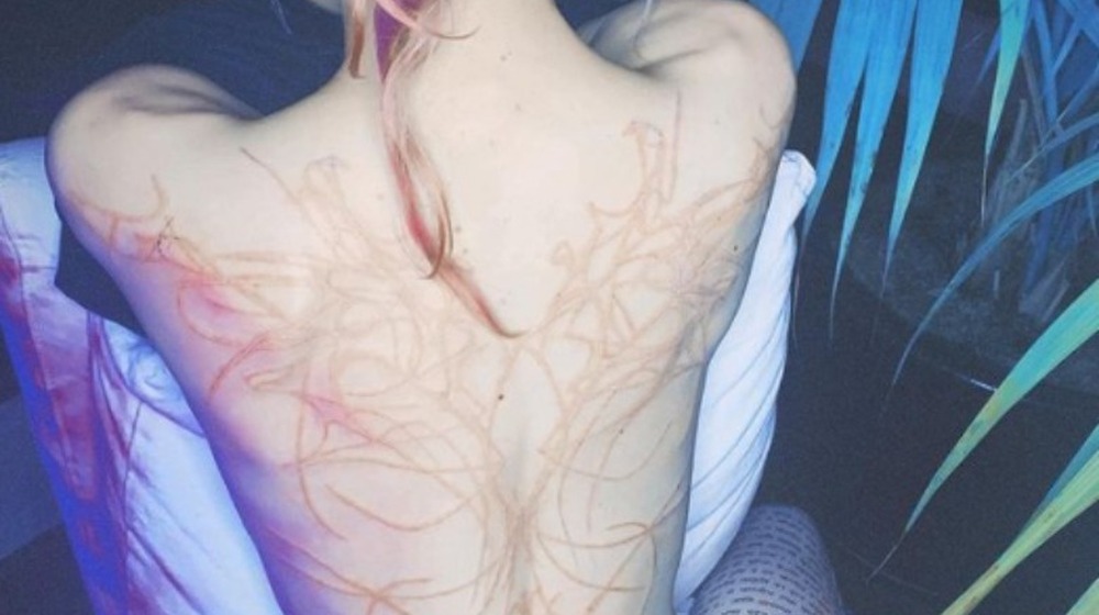 Why Grimes' New Tattoo Has People Talking