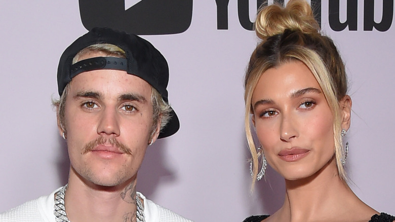 hailey and justin bieber posing