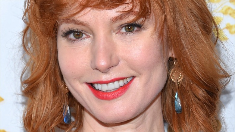 Alicia Witt smiling at camera