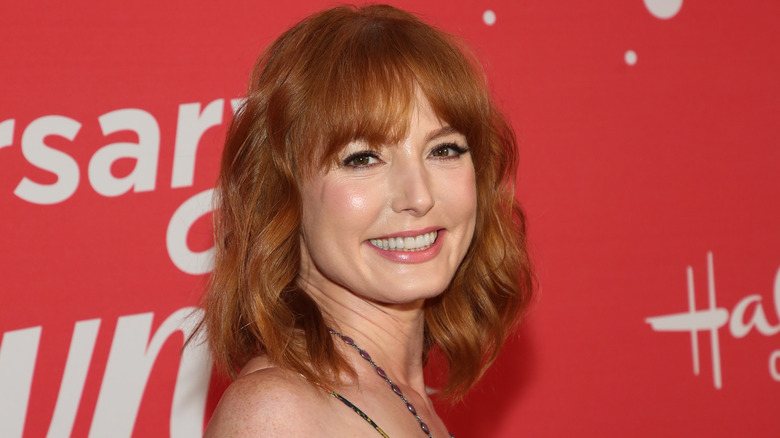 Alicia Witt smiling at Hallmark's anniversary