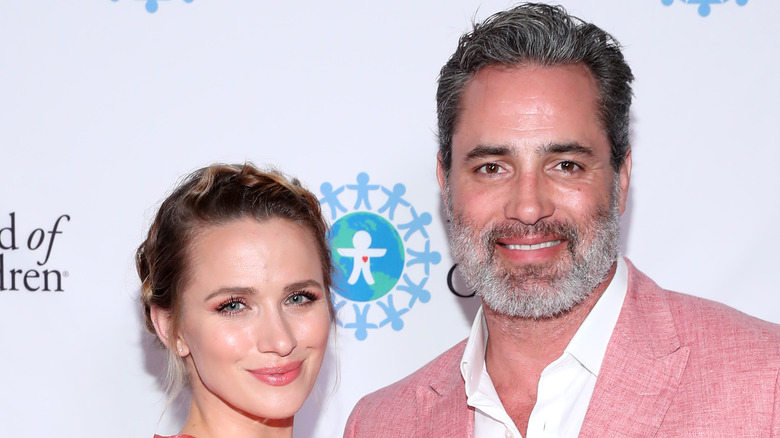 Shantel VanSanten and Victor Webster smiling