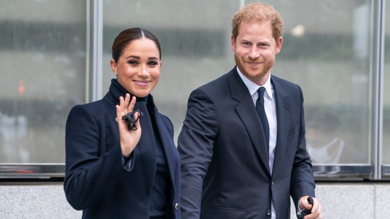 Prince Harry and Meghan smiling