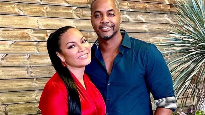 Egypt Sherrod and Mike Jackson pose for photo together