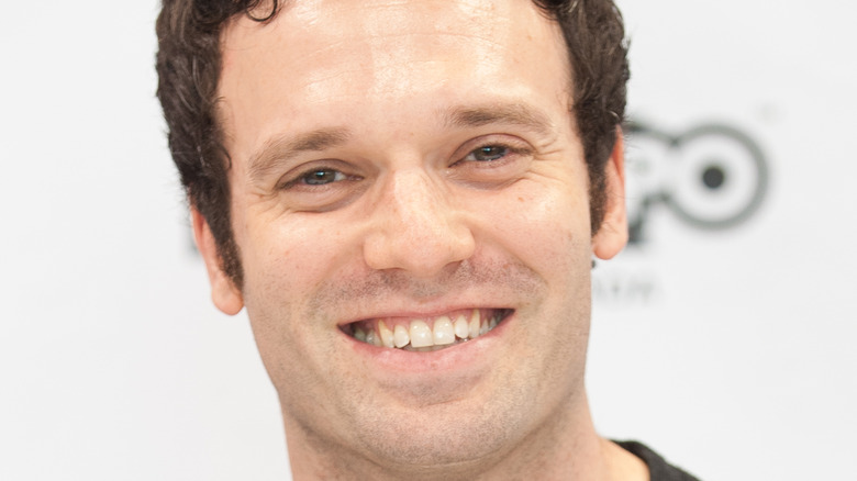 Jake Epstein, smiling