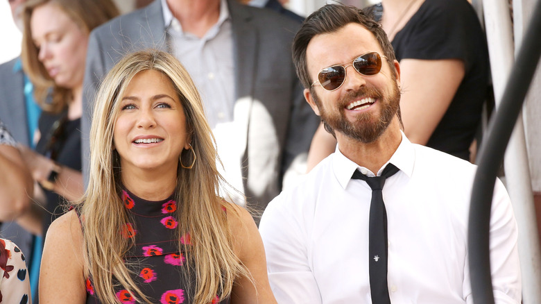 Jennifer Aniston and Justin Theroux smiling