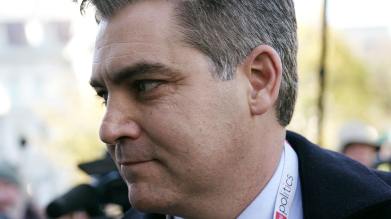Jim Acosta looking to his right 