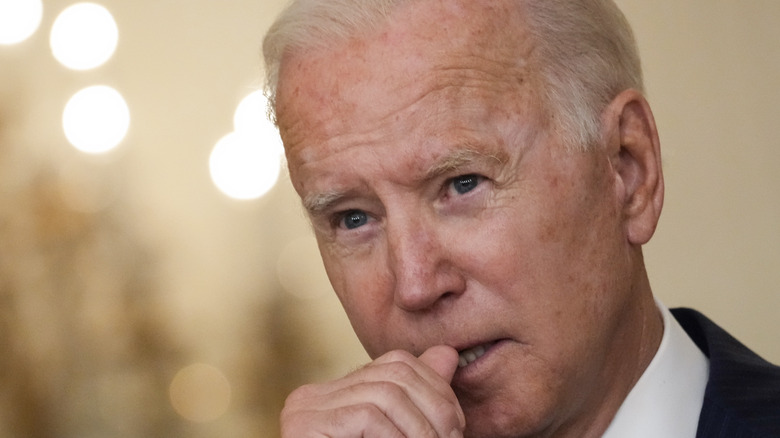 Joe Biden listens to a question