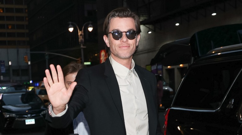 John Mulaney waving
