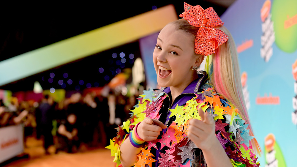 JoJo Siwa poses on the red carpet