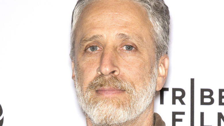 Jon Stewart posing 