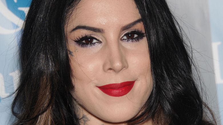 Kat Von D poses on the red carpet