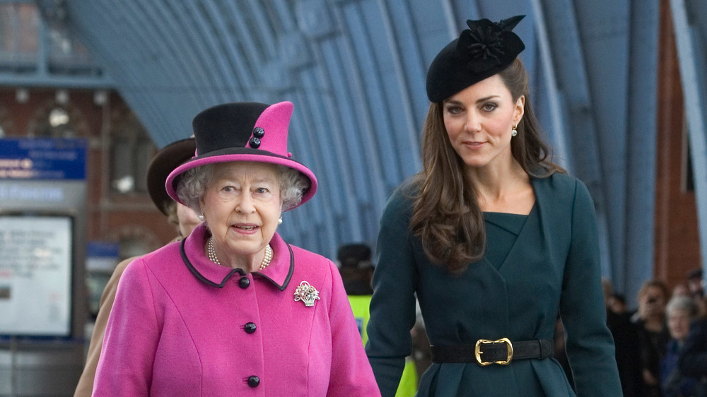 Queen Elizabeth walking with Kate Middleton